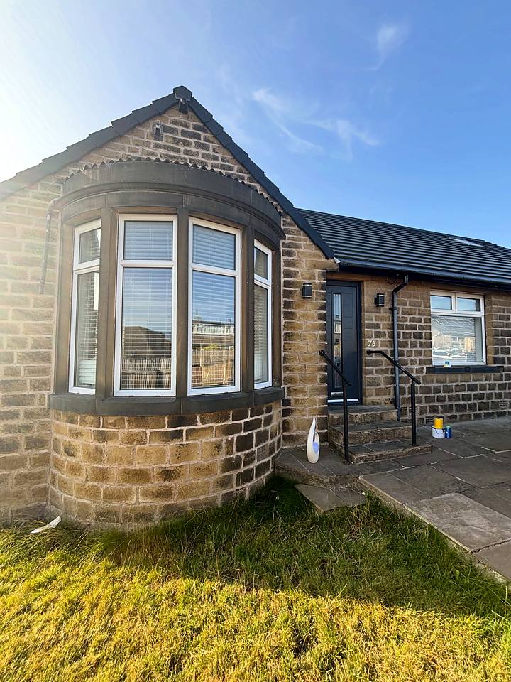 Bay window & patio door: Anthracite RAL 7016, stone bungalow bay window and patio door resprayed in anthracite grey